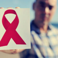 What are the causes and symptoms of AIDS?